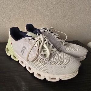 On Running White and Light Green Athletic Shoes